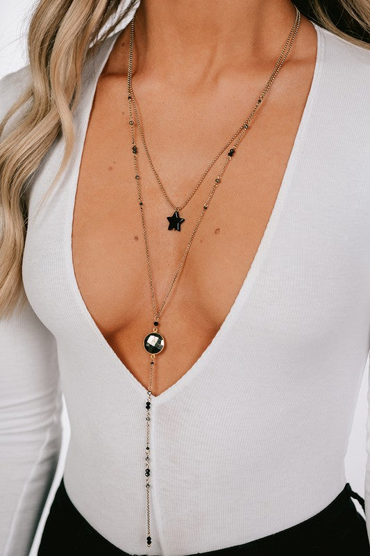 Black/Antique Gold Layered Lariat Necklace with Bead and Charm Detail